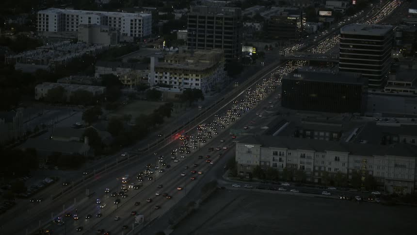 Aerial view of a city with heavy traffic below