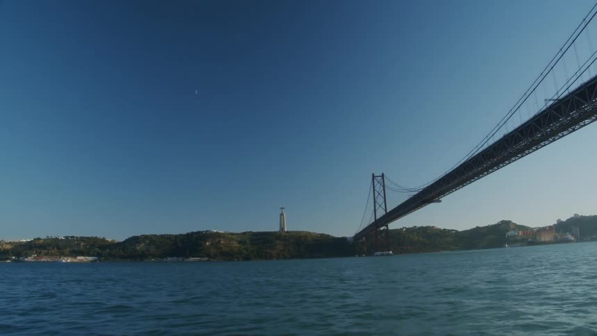 A bridge is shown over a the open water