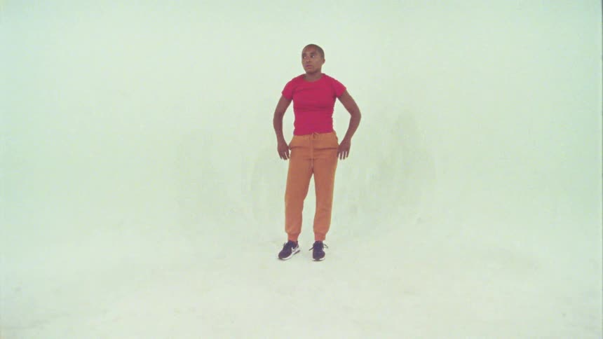 A portrait of a person in a studio