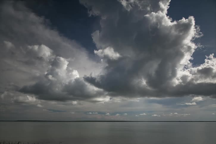 Time lapse of clouds moving across the ocean