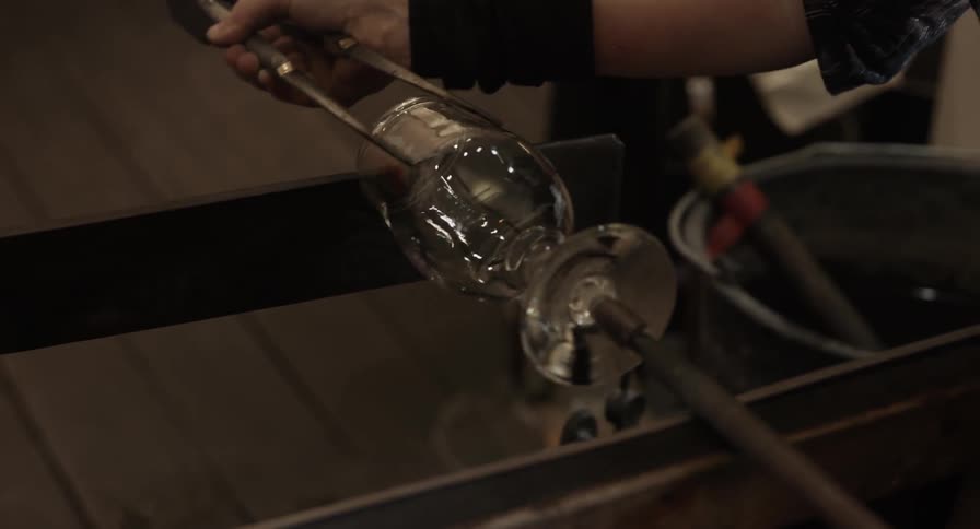 Glassblower forming a wine glass