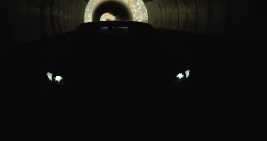 A vehicle drives on the roads through multiple tunnels