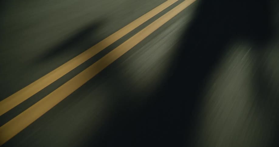 Winding road with a double yellow line in the middle