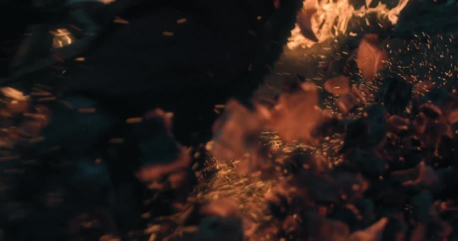 Bicycle driving on a burning forest disturbs a bed of smoldering coals