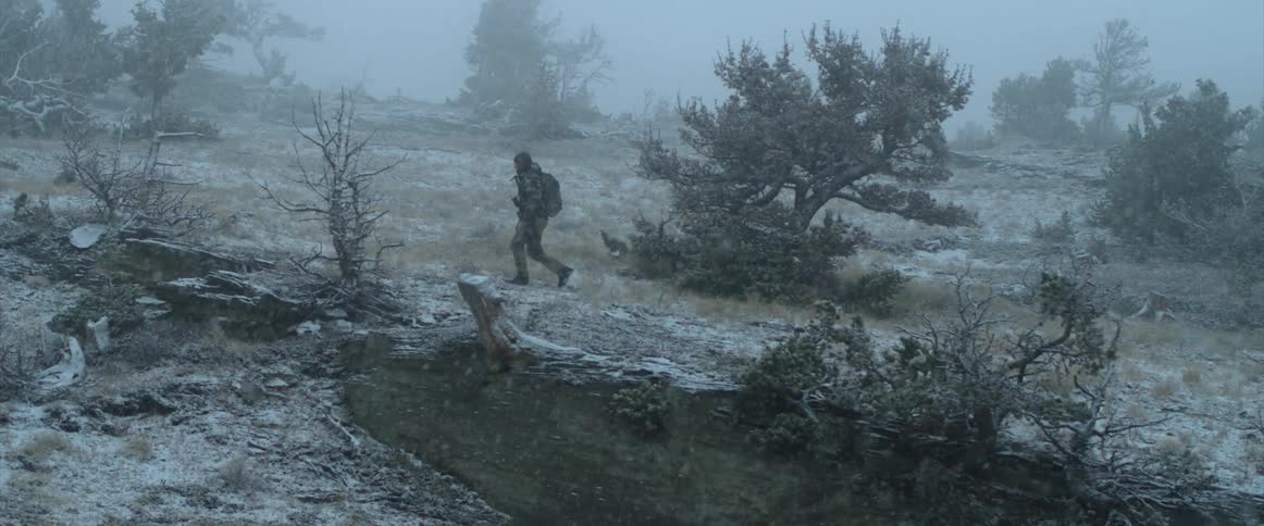Man walking outdoors in snow