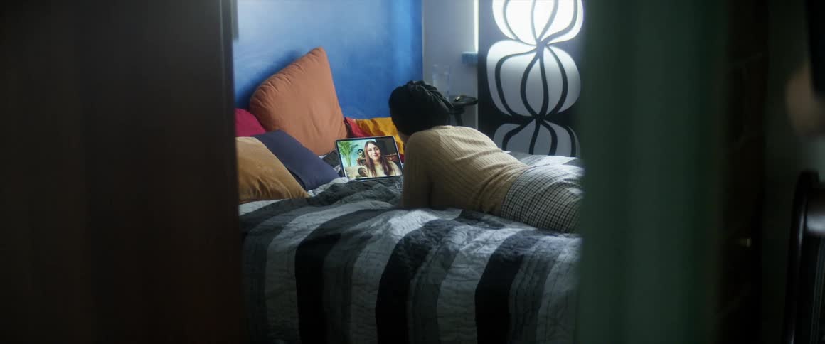Female talking to her friend on her tablet or laptop