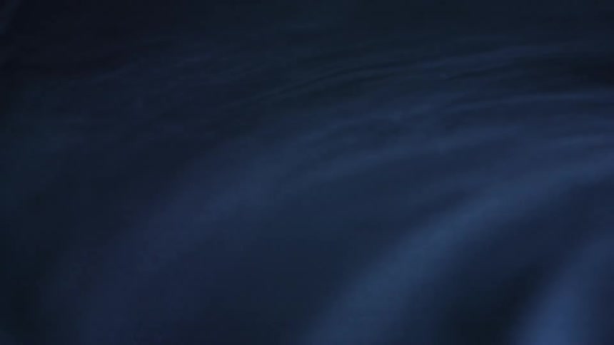 White smoke floating and swirling from dry ice floating in water