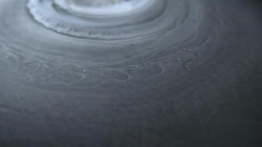 Ice rotating and melting in a bowl