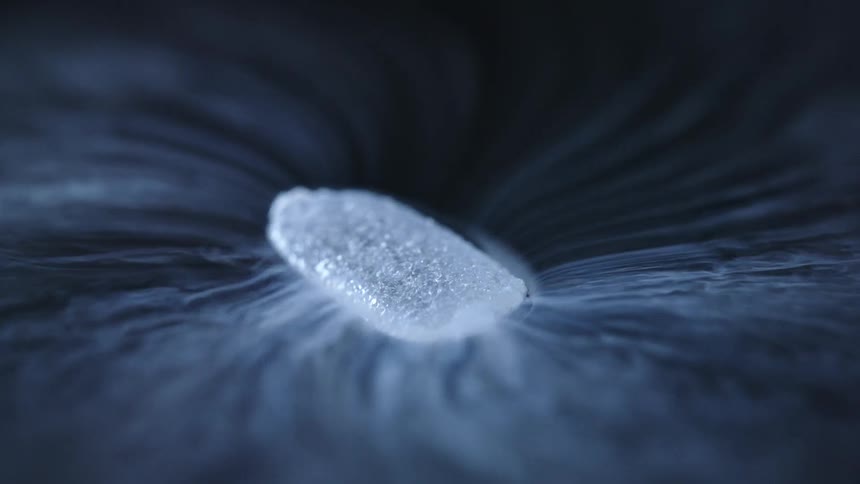 Black white and gray colors that look like liquid nitrogen melting