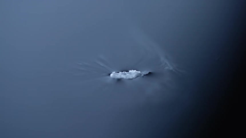 White black and gray colors that look like liquid nitrogen melting