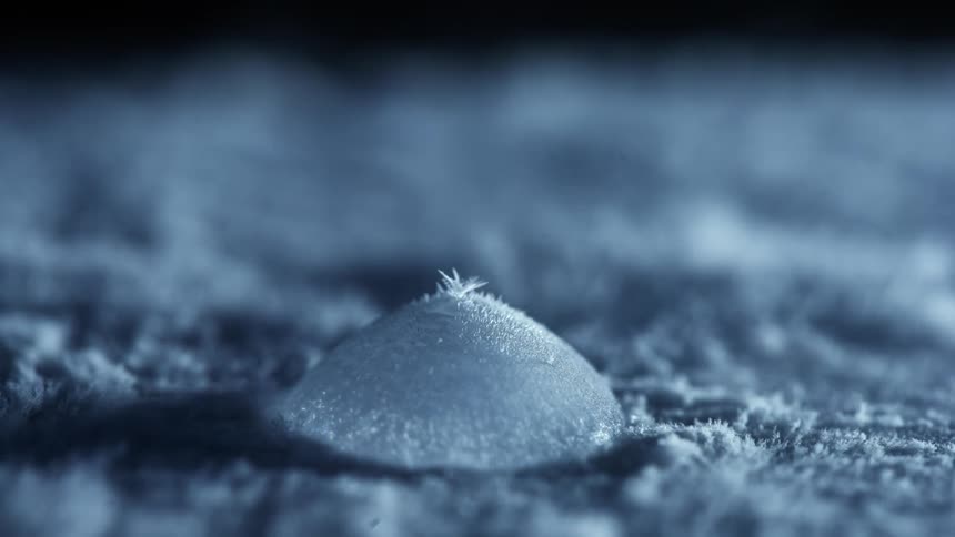 Water bubble freezes and frosts over