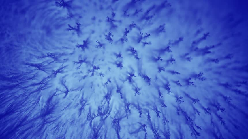 Blue white and gray colors that look like ice freezing
