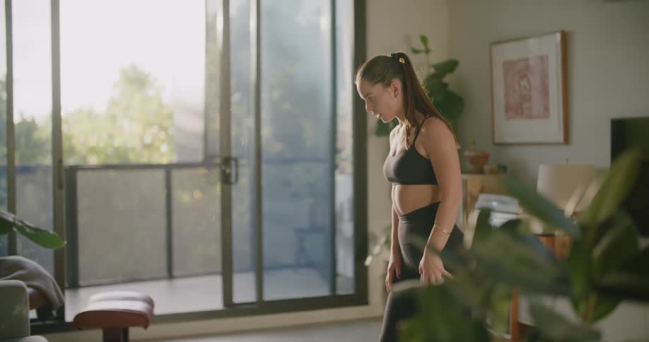 A woman that is stretching before working out