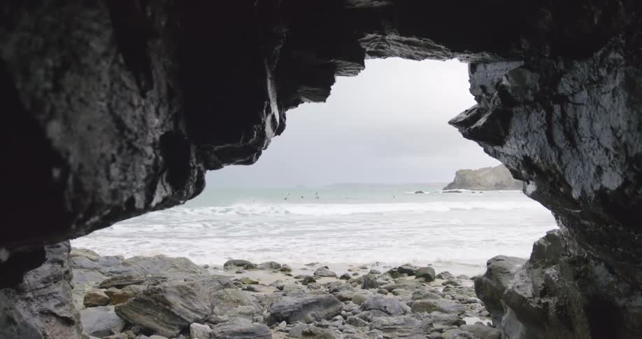 A view of ocean waves moving towards the coast is displayed