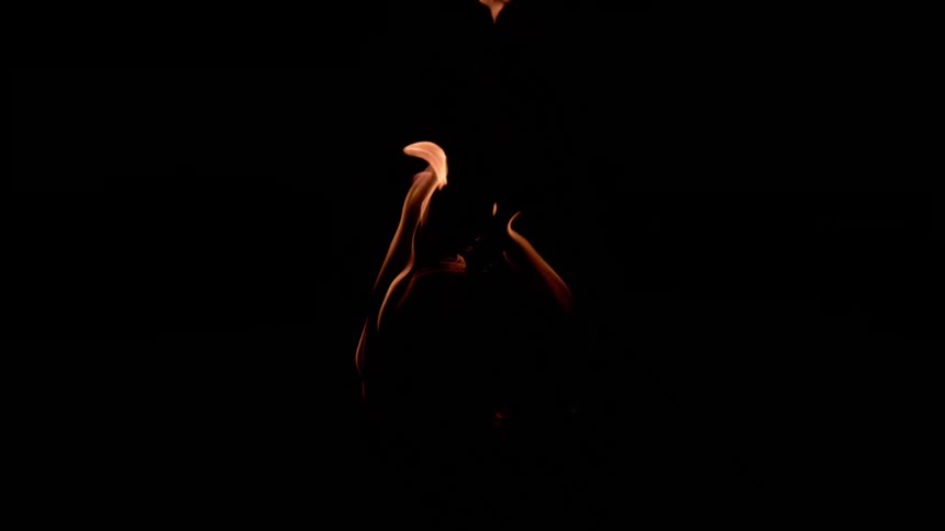 Flames shooting high in the darkness