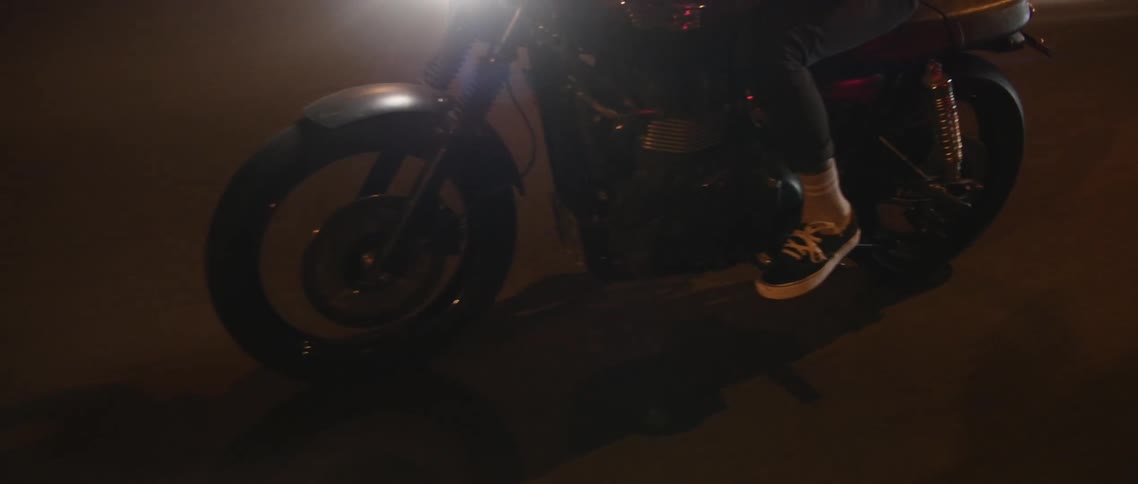 A person that is riding on a motorcycle
