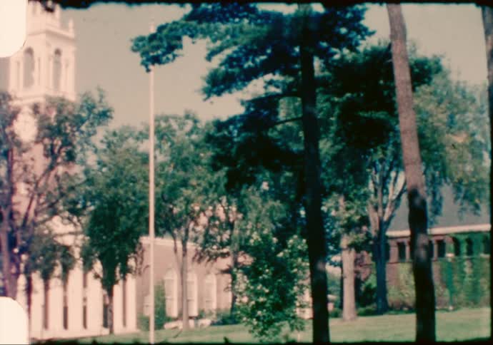 A view of a neighborhood with a church in it