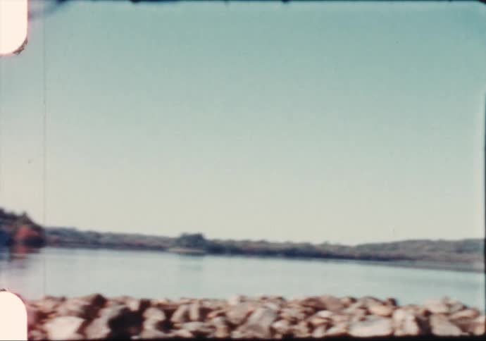 A panoramic view of a lake during the fall