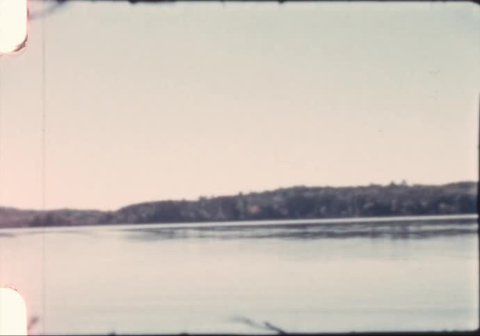 A panoramic view of a lake in Maine during the fall