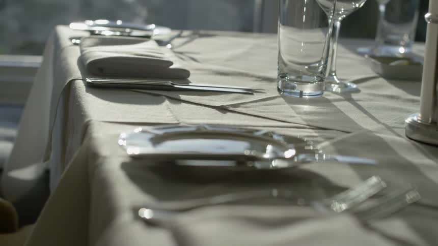 A table is set with plates and glasses