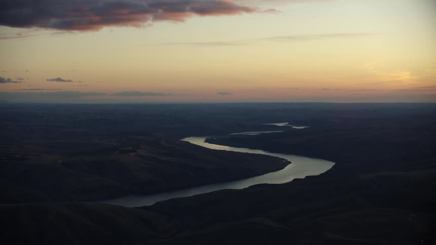 Gorgeous super side of the Lower Snake River at sunset from high above as it meanders west towards the Pacific Ocean