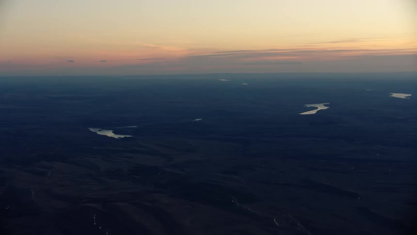 Blue hour super wide aerial shot of the Palouse country of esatern Washington with the Lower Snake River flowing west towards Portland, Orgon