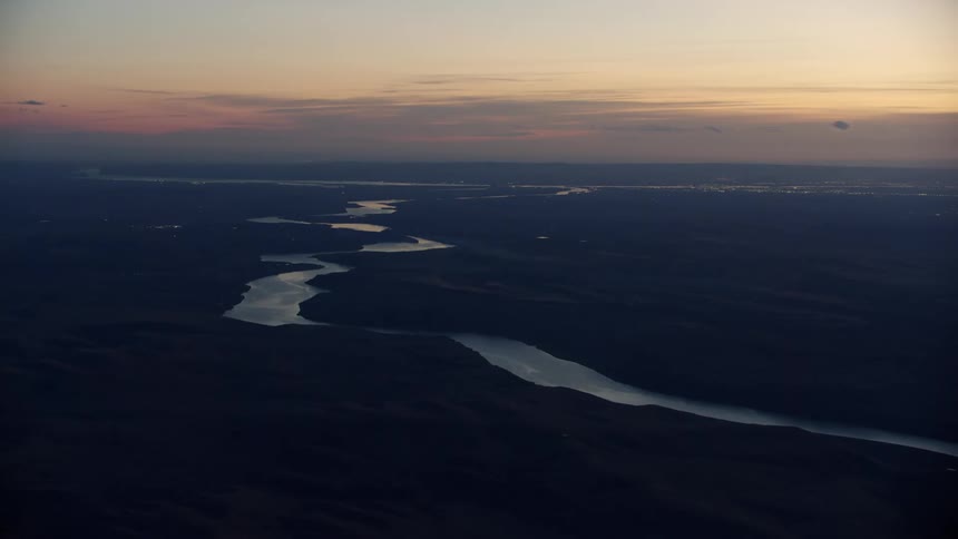 The Lower Snake River heads west at sunset from this sweeping aerial that reminds us there's a lot of space out there to explore