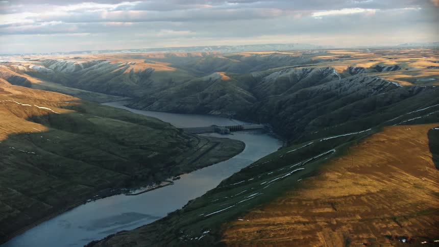 Granite Dam built by the Army Corp of Engineers  on the Lower Snake River as seen in winter from this super wide aerial