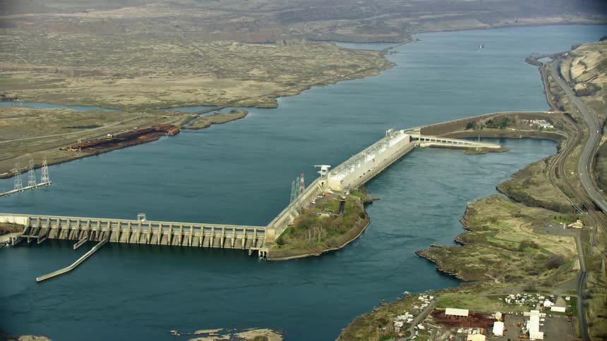 The Dalles Dam as pictured in this aerial high above the Columbia River, this dam has an unusual shape and impounds the Columbia River and Celilo Falls