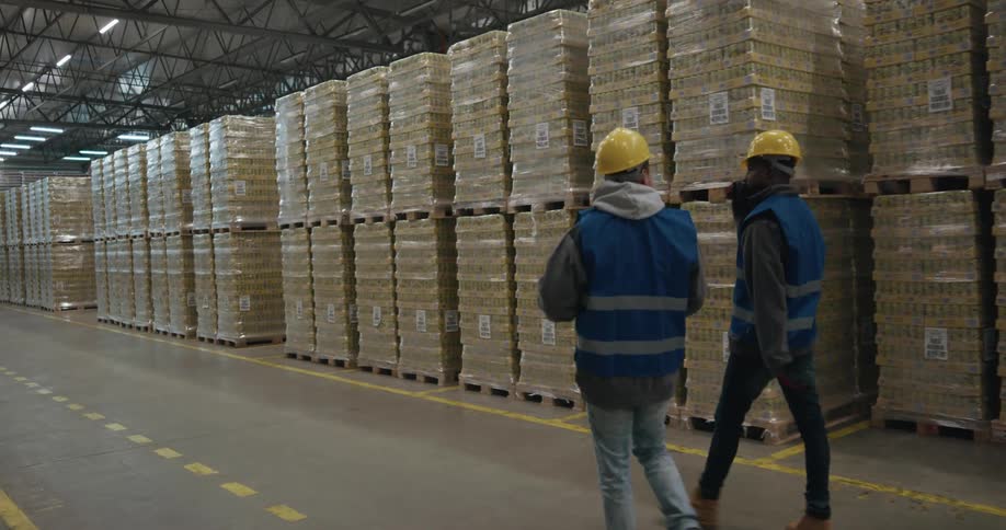 Warehouse workers talking