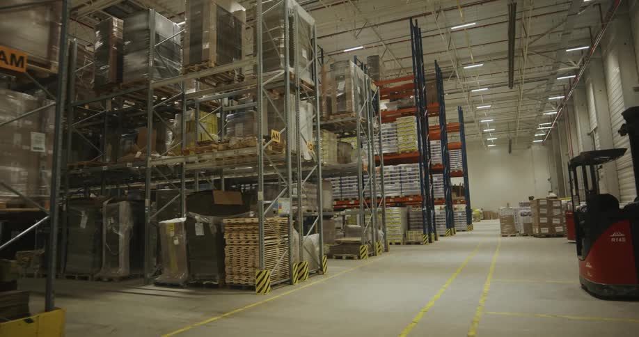 A warehouse with shelves and boxes