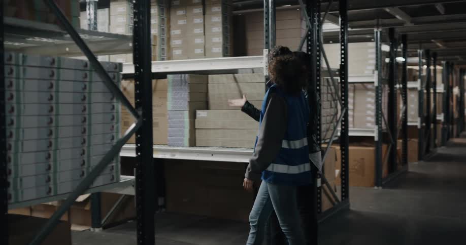 Warehouse worker and client center aisle