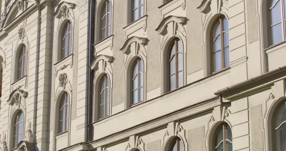 The building is tall with many windows