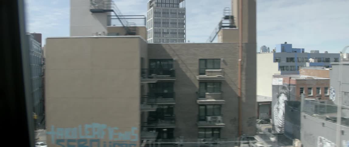 Moving past tall city buildings