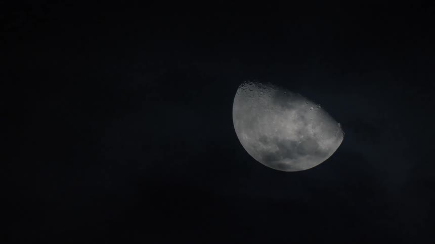 Crescent moon shines in the sky at night