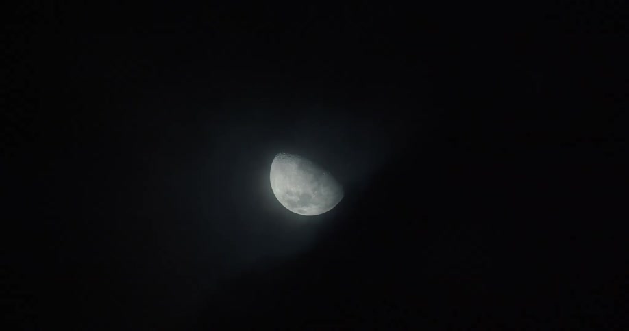 Crescent moon shines in the sky at night