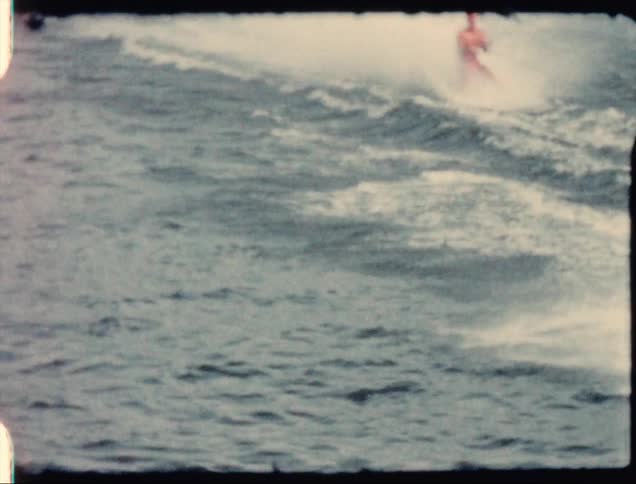 A person that is water skiing on a lake