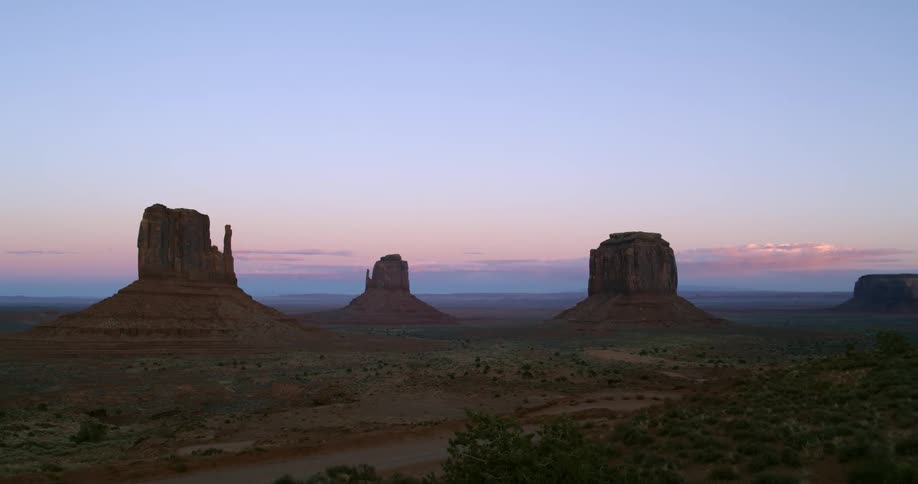 A mesa stretches across a vast landscape