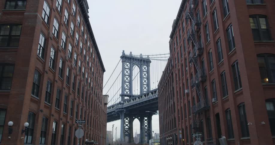 A view of a bridge from road near a building