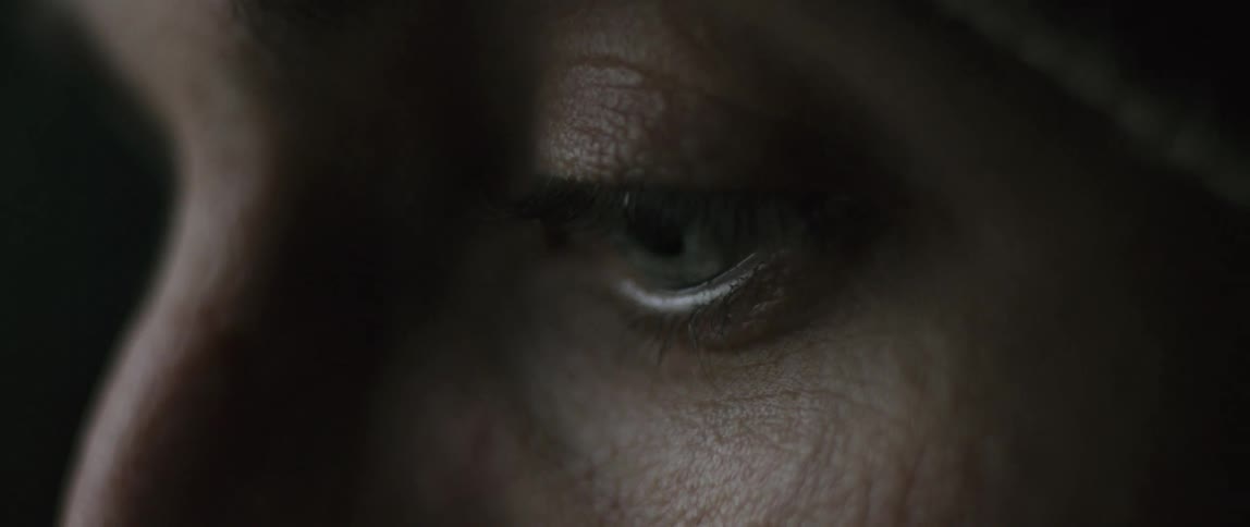 A person opens their eyes wider