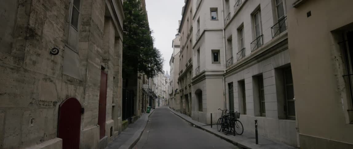 View of an abandoned street lined with buildings