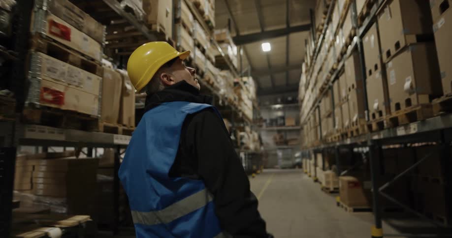 An employee walking through a warehouse