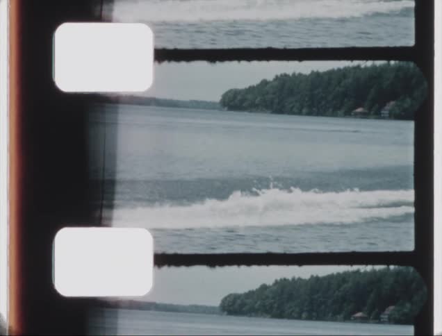 A person skiing behind a boat