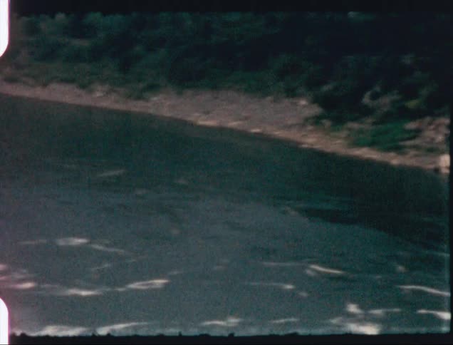 River water churns and flows down a waterfall