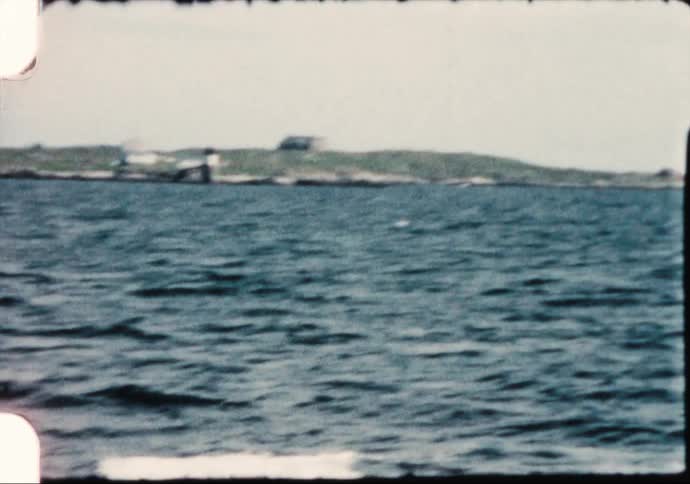 Calm ocean waters near the coast caught on vintage film