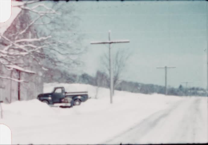 Men shovel snow after a winter storm in Maine in the 1950s