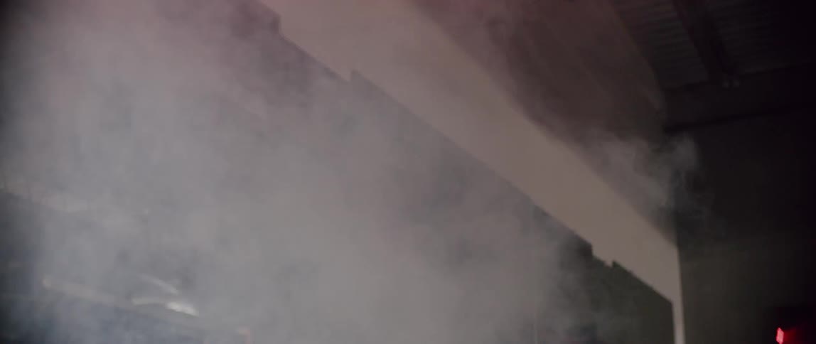 Smoke pours into the warehouse
