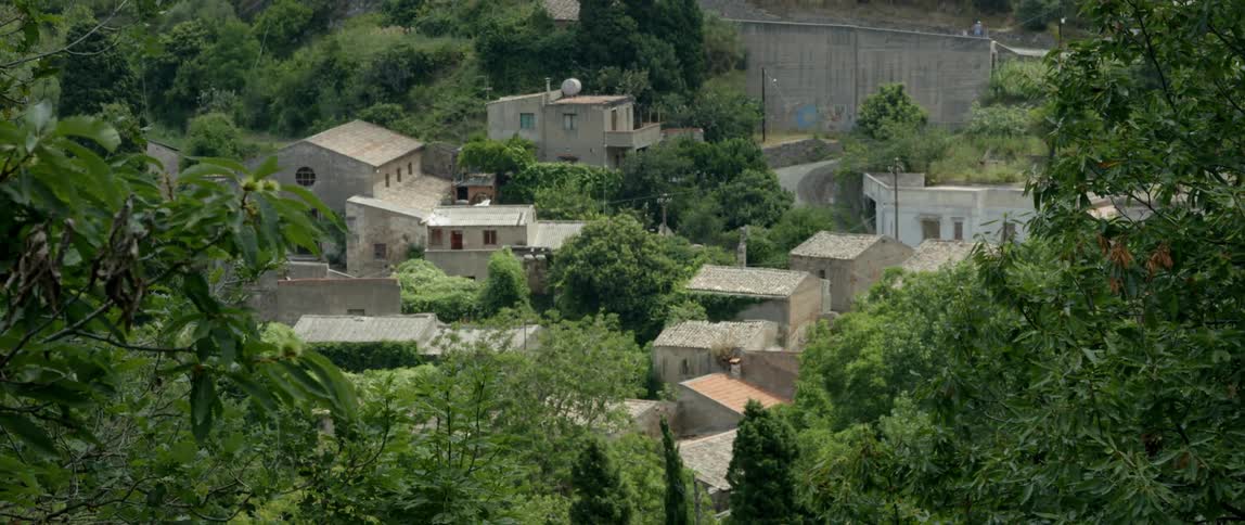 Overhead view of buildings and their rooftops