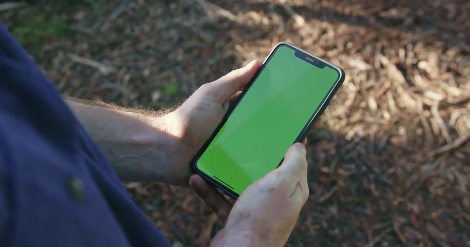 Man holds a smartphone
