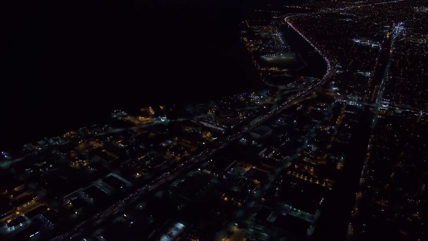 Aerial view of the streets and buildings on the citys downtown at night